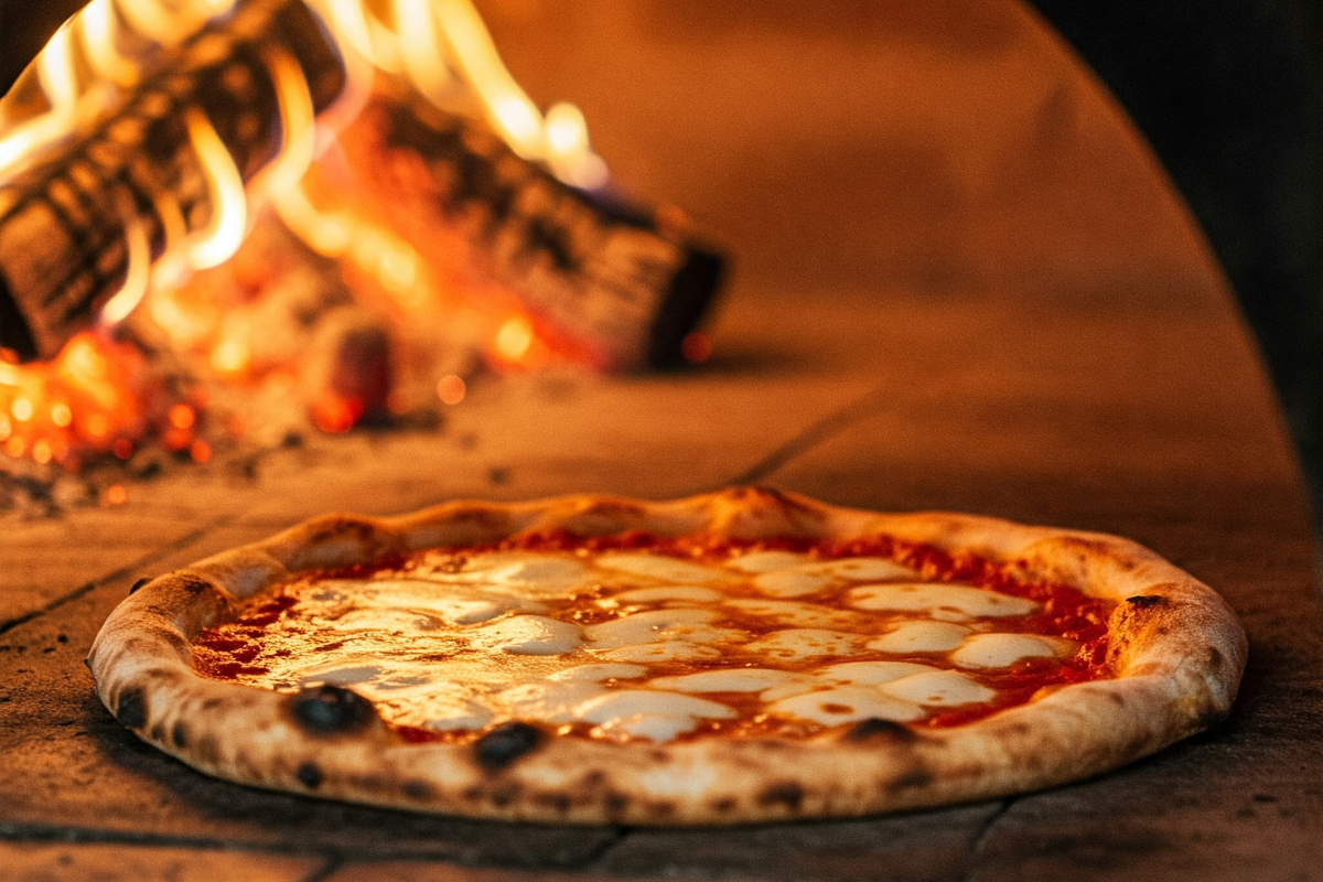  Neapolitan pizza baking in a wood-fired oven.